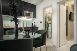 Kuchyň nebo kuchyňský kout v ubytování Apartments Antonia