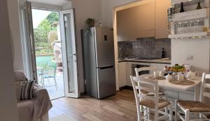 Kuchyň nebo kuchyňský kout v ubytování Ohana Florence Suite