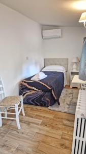 Postel nebo postele na pokoji v ubytování Ohana Florence Suite