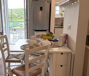 Kuchyň nebo kuchyňský kout v ubytování Ohana Florence Suite