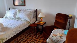 Ένα ή περισσότερα κρεβάτια σε δωμάτιο στο Matthew home