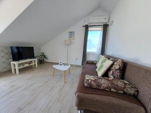Televízia a/alebo spoločenská miestnosť v ubytovaní Adriatic Pearl Korcula