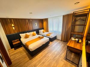 Ein Bett oder Betten in einem Zimmer der Unterkunft Galata Calm Tale Hotel