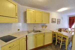 Kuchnia lub aneks kuchenny w obiekcie Residence Au Vieux Grenier