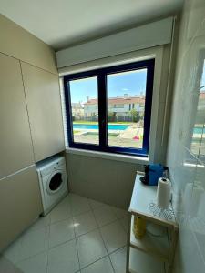 Swimmingpoolen hos eller tæt på apartamento da marginal