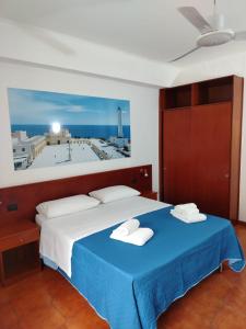 A bed or beds in a room at Residence Stella Maris