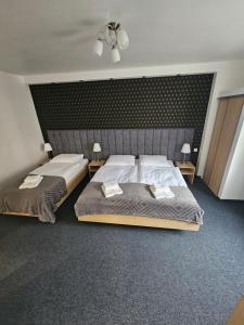 Posteľ alebo postele v izbe v ubytovaní Apartamenty N 25 Przy Kaponierze