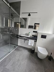 Kúpeľňa v ubytovaní Apartamenty N 25 Przy Kaponierze