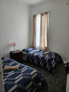 Postel nebo postele na pokoji v ubytování Euro Nomads