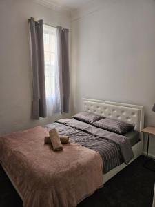 Postel nebo postele na pokoji v ubytování Euro Nomads
