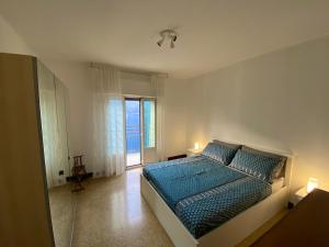 Postel nebo postele na pokoji v ubytování Casa Luciano