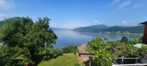 a view of a river from a house at Vila Hedona in Donji Milanovac