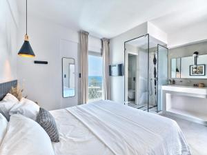 Voodi või voodid majutusasutuse Magoo Suites toas