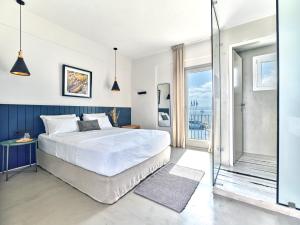 Voodi või voodid majutusasutuse Magoo Suites toas
