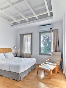 Voodi või voodid majutusasutuse Magoo Suites toas