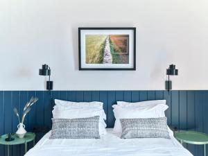 Voodi või voodid majutusasutuse Magoo Suites toas