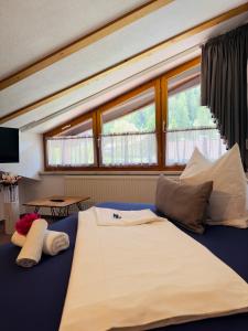 En eller flere senge i et værelse på Ferienwohnung Vesna & Alex