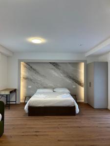 Postel nebo postele na pokoji v ubytování Albergo Panorama + 37 fotografií