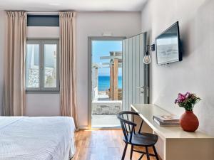 Voodi või voodid majutusasutuse Magoo Suites toas
