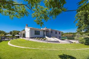 Ein Garten an der Unterkunft Villa Monte Uliveto