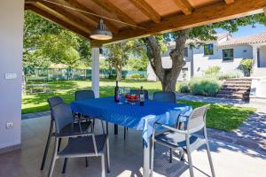 Ein Garten an der Unterkunft Villa Monte Uliveto