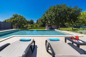 Der Swimmingpool an oder in der Nähe von Villa Monte Uliveto