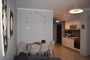 A kitchen or kitchenette at Mavrikios Luxury Apartment