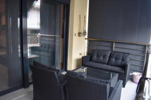 A seating area at Mavrikios Luxury Apartment