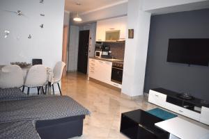 A kitchen or kitchenette at Mavrikios Luxury Apartment