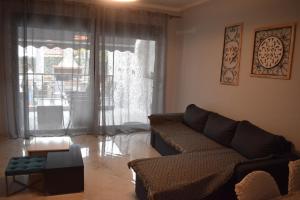A seating area at Mavrikios Luxury Apartment