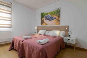 Postel nebo postele na pokoji v ubytování CINCO VILLAS