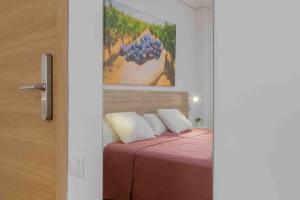 Postel nebo postele na pokoji v ubytování CINCO VILLAS