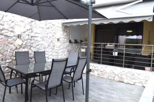 A balcony or terrace at Mavrikios Luxury Apartment