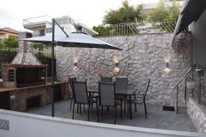 A balcony or terrace at Mavrikios Luxury Apartment