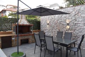 A patio or other outdoor area at Mavrikios Luxury Apartment