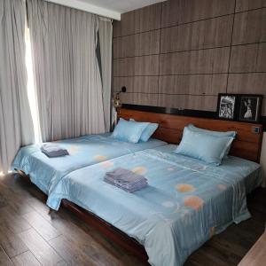 Ένα ή περισσότερα κρεβάτια σε δωμάτιο στο CHILCHILL Hotel Riverside