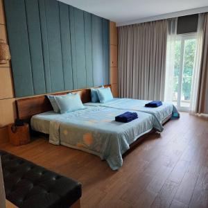 Ένα ή περισσότερα κρεβάτια σε δωμάτιο στο CHILCHILL Hotel Riverside