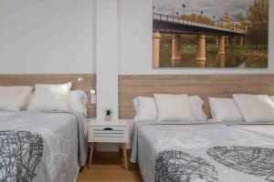 Postel nebo postele na pokoji v ubytování CINCO VILLAS