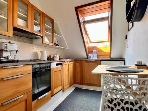 Kuchyň nebo kuchyňský kout v ubytování Apartman Mala Strana -Piece and quiet