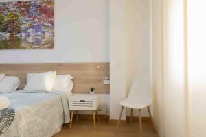 Postel nebo postele na pokoji v ubytování CINCO VILLAS