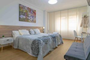Postel nebo postele na pokoji v ubytování CINCO VILLAS