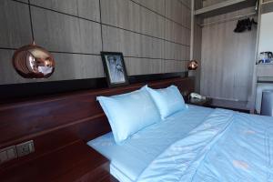 Ένα ή περισσότερα κρεβάτια σε δωμάτιο στο CHILCHILL Hotel Riverside