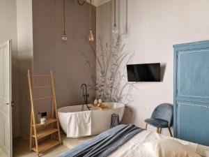 TV a/nebo společenská místnost v ubytování Erbe12 loft&park