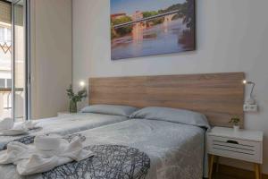 Postel nebo postele na pokoji v ubytování CINCO VILLAS