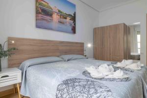 Postel nebo postele na pokoji v ubytování CINCO VILLAS