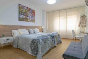 Postel nebo postele na pokoji v ubytování CINCO VILLAS