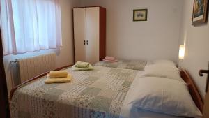 Postel nebo postele na pokoji v ubytování Apartment Zdenka-5 km from Opatija