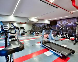a gym with cardio equipment in a gym at Cyclinn Berrini in Sao Paulo