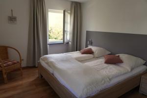 Llit o llits en una habitació de Feriengut Bohn