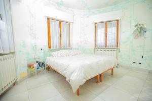 フォンテブランダにあるAffitti Brevi Toscana - Villa Chicの部屋にベッドがある寝室 +15枚の写真